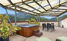 A view of Mount Warning bed and Breakfast Logo and Images