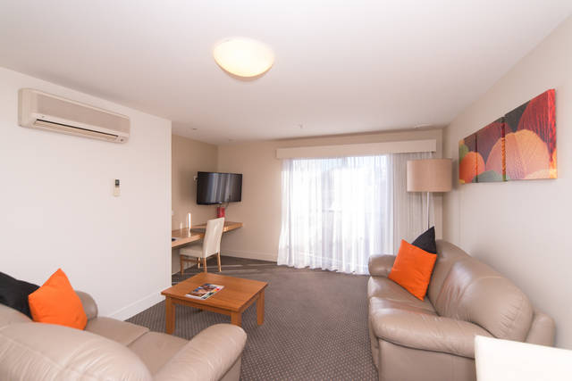 The Old Woolstore Apartment Hotel Logo and Images