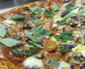 Mezzadellas Woodfired Pizza and Tapas Logo and Images