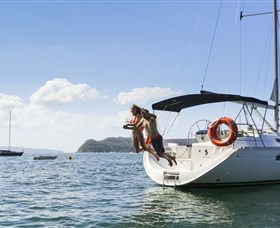 Taylor Made Escapes Yacht Charters and Cruises Logo and Images