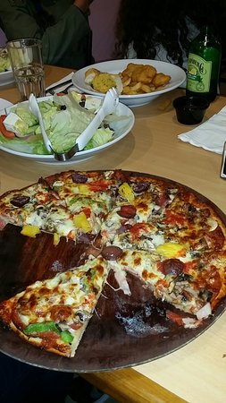 Jailhouse Rock Pizzeria Logo and Images