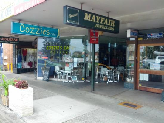 Cozzies Cafe Cuizine Logo and Images