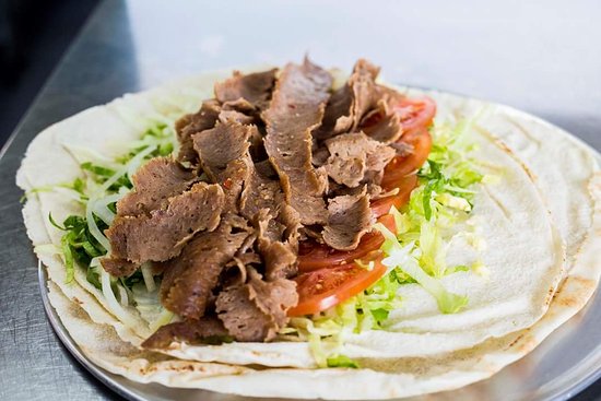 Uncle Nick's Kebab Kafe Logo and Images