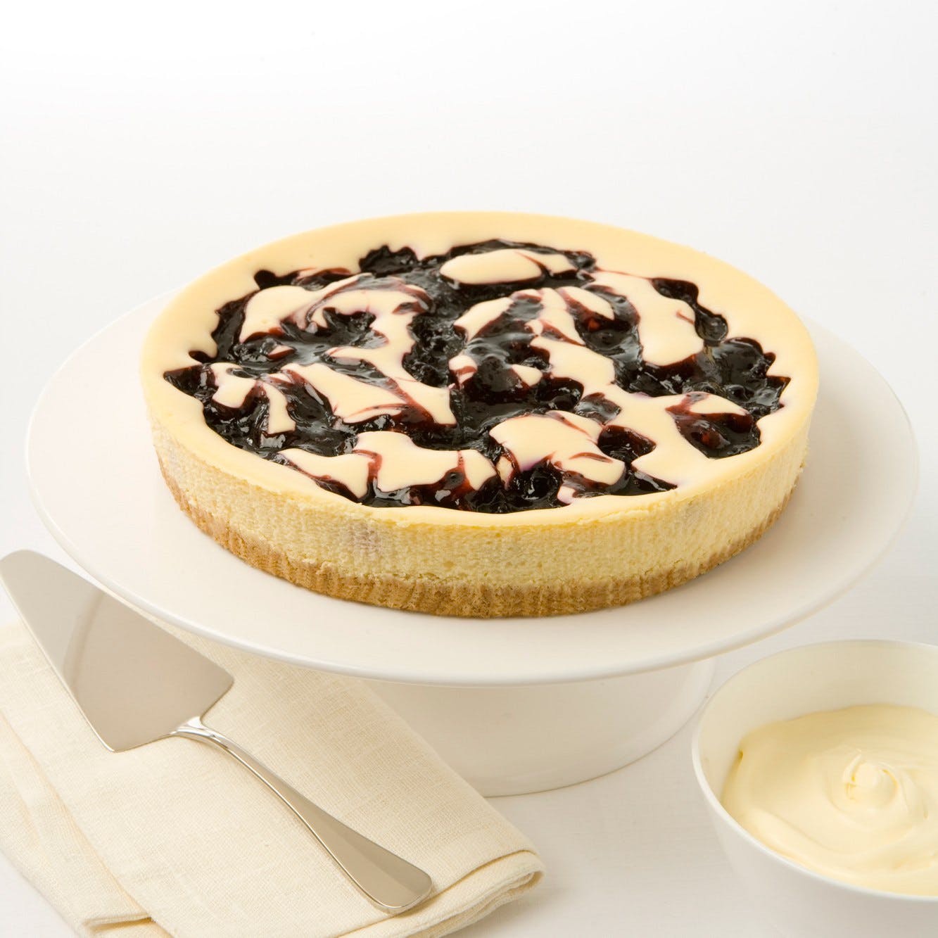 The Cheesecake Shop - Mermaid Beach Logo and Images