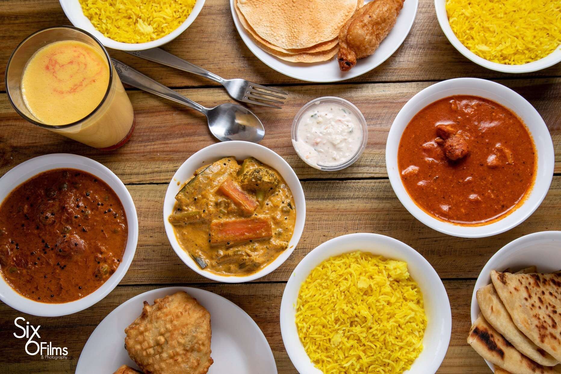Daya Indian Cuisine Logo and Images