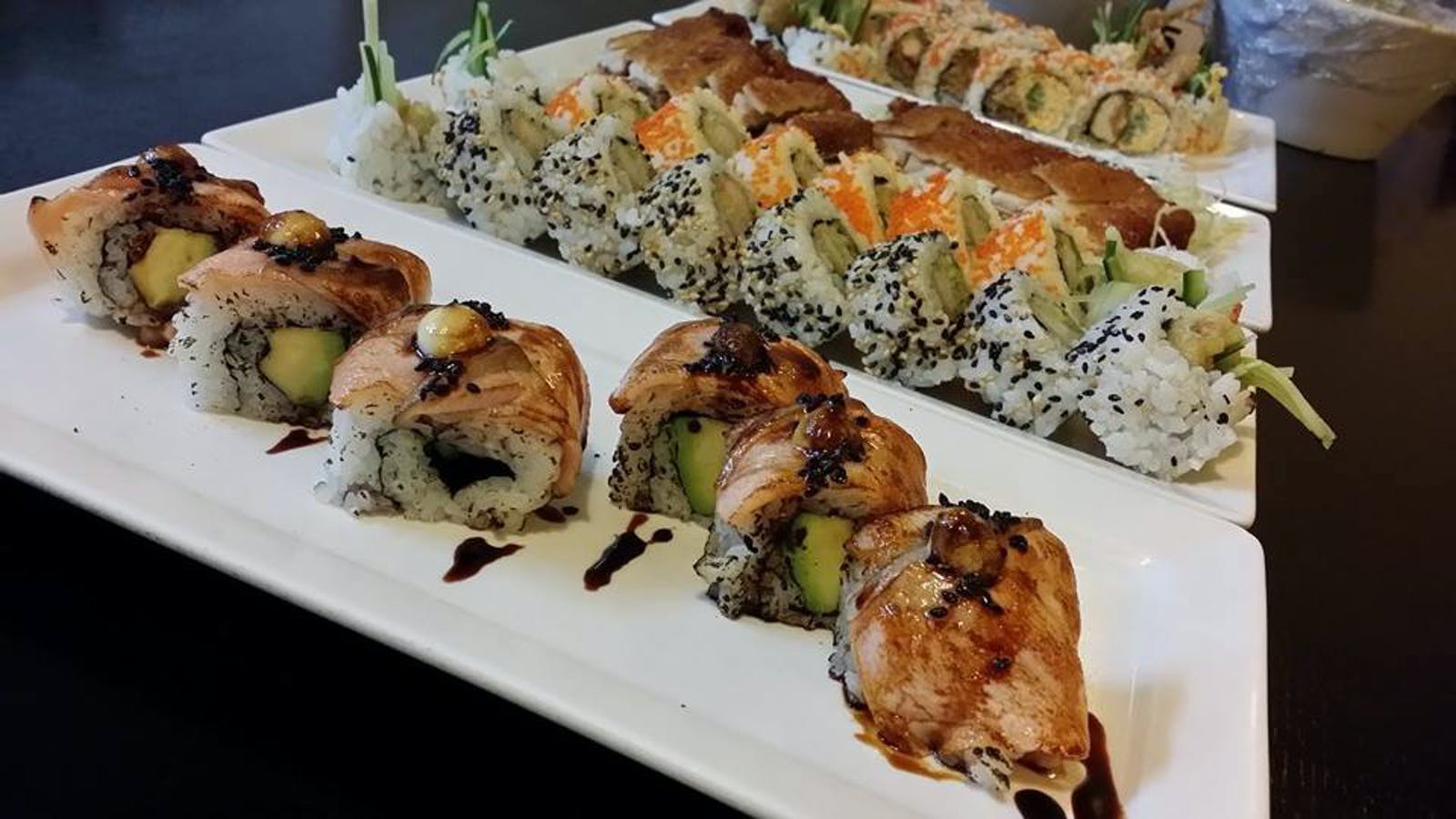 Oishii Sushi Bar Logo and Images