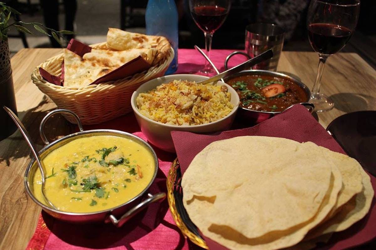 Gandhi Indian Kitchen & Laneway Stall Logo and Images