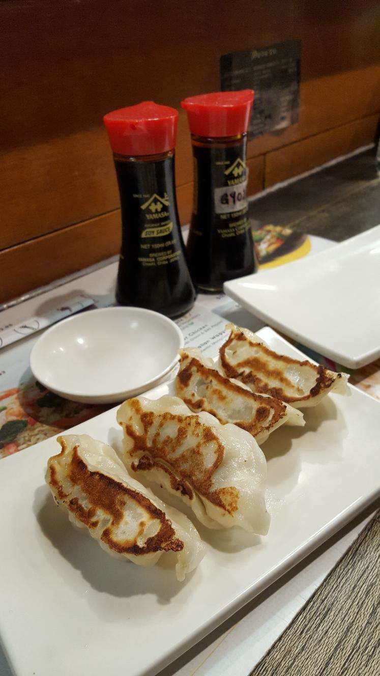 Yum Yum Gyoza House Logo and Images