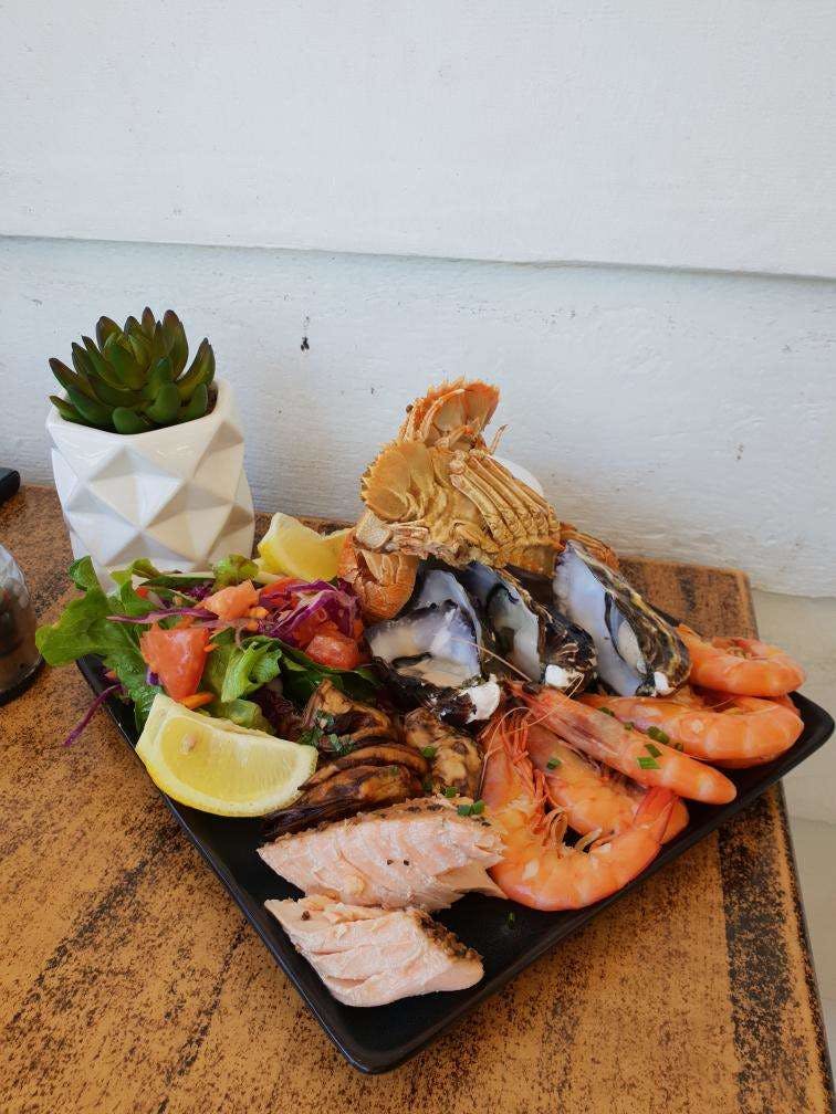Maisie's Seafood and Steakhouse Logo and Images