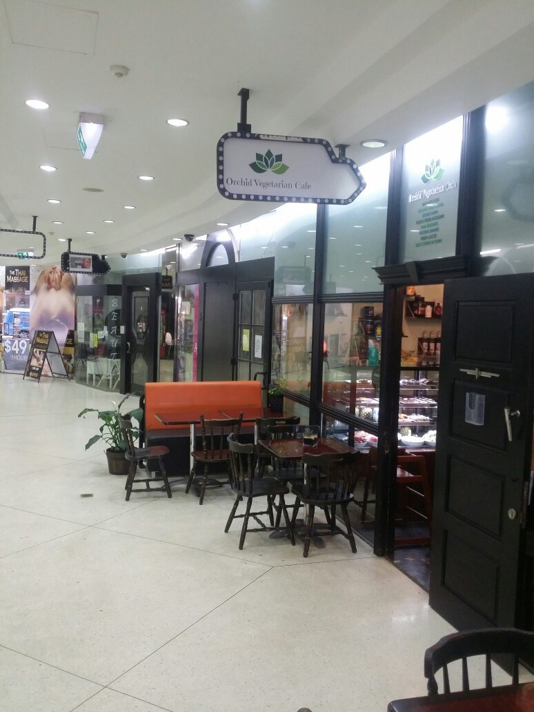 Orchid Vegetarian Cafe Logo and Images