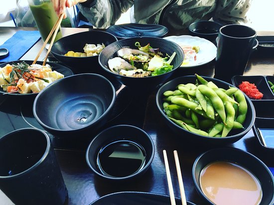 Momo Sukiyaki & Shabu Shabu Logo and Images