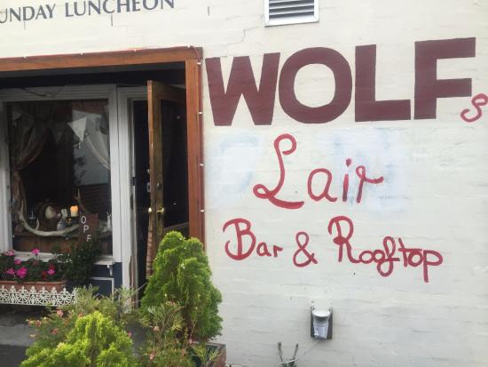 Wolf's Lair Drinking Haus and Treetop Logo and Images