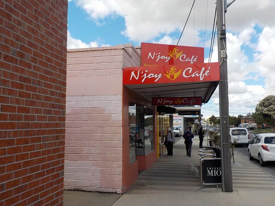 N ' Joy Cafe Logo and Images